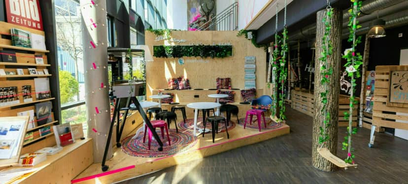 Waldbühne at Smartvillage: Tiered biophilic breakout zone for corporate events and workshops.