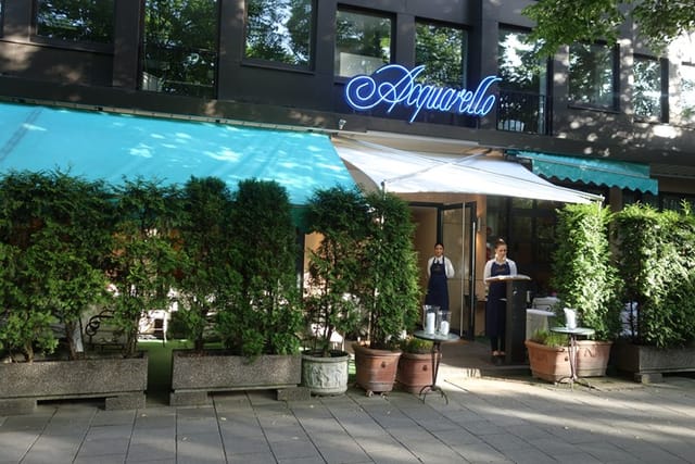 Charming Acquarello restaurant with outdoor terrace for corporate dinners and client events.