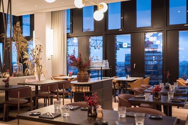 Upscale Fitzroy Munich venue with modern layout for corporate dinners and networking events.