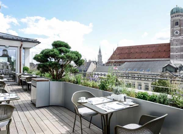 Blue Spa Bar rooftop terrace with city views for corporate networking and breakfast events.