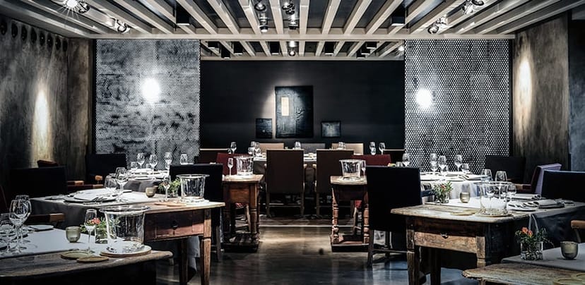 Industrial-chic restaurant for intimate corporate dinner or VIP board luncheon.