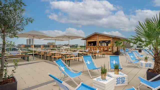 Munich Marriott City West rooftop venue for corporate happy hour and networking events.