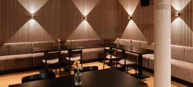 Y.OUR Pavillon cafeteria: tiered lighting, professional workshop space, VIP networking venue.