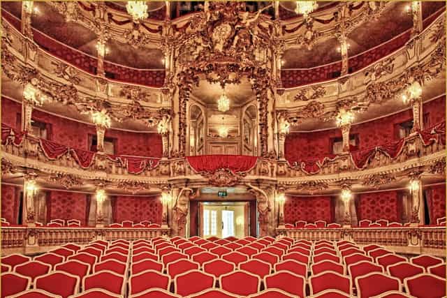 Cuvilliés-Theater interior featuring ornate gold décor for gala awards and keynote presentations.