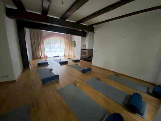 Yoga retreat center at Schlosspalais with architectural beams for wellness and corporate events.