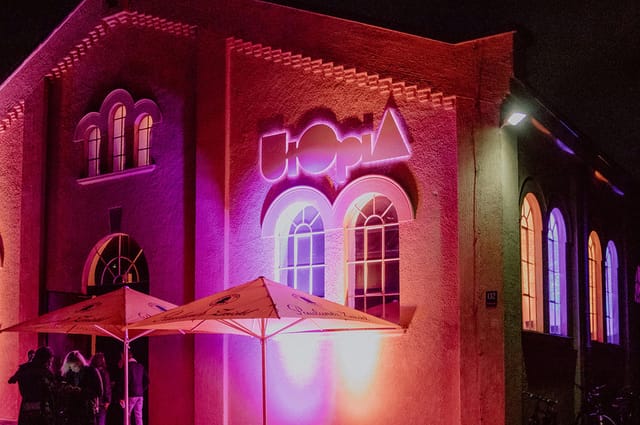 Industrial event space in Utopia with architectural lighting for corporate events and galas.