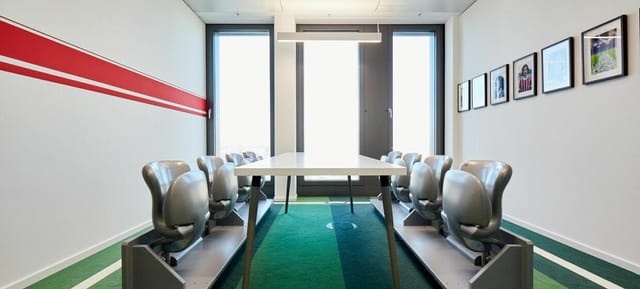 High-design boardroom at DECK7 with linear seating for corporate meetings and executive events.