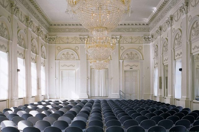 Max-Joseph-Saal theater-style ballroom for formal corporate presentations and keynote events.