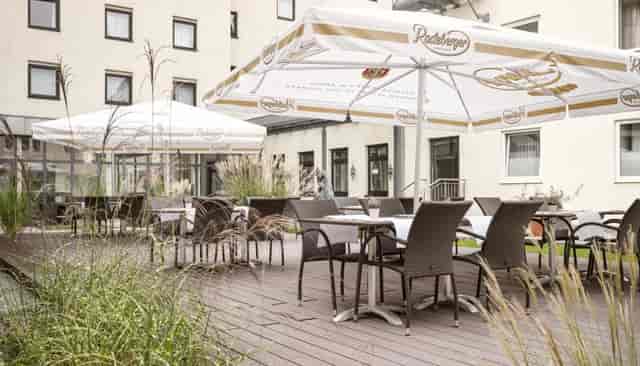 Outdoor terrace for corporate networking and conference receptions at Flemings Hotel Munich.