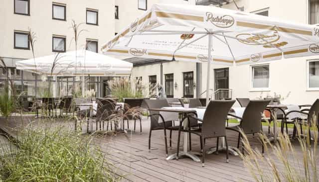 Outdoor terrace for corporate networking and conference receptions at Flemings Hotel Munich.