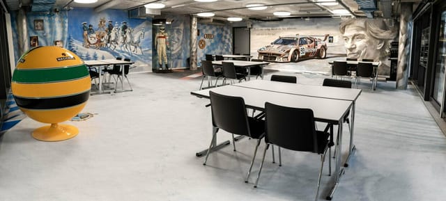 Zeppelin Lounge at Motorworld Munich: Industrial breakout space for team-building and workshops.