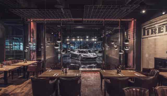 Luxury supercar centerpiece at Drivers Hall, Motorworld München for product launches and VIP dinners.