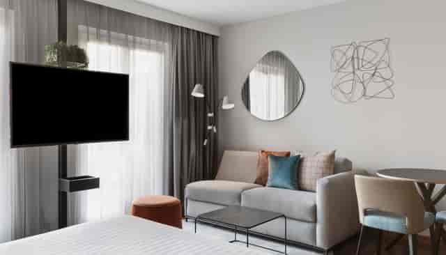 Residence Inn Munich City East studio suite with workspace for corporate events and business travel.