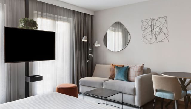 Residence Inn Munich City East studio suite with workspace for corporate events and business travel.
