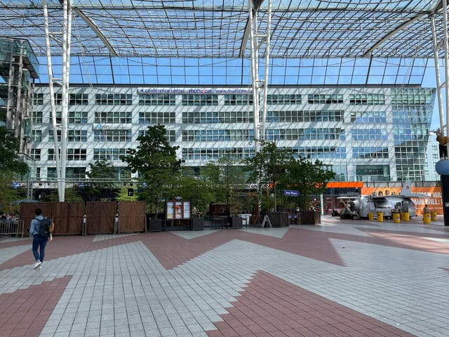 Modern covered outdoor conference venue for pop-up markets and networking events.