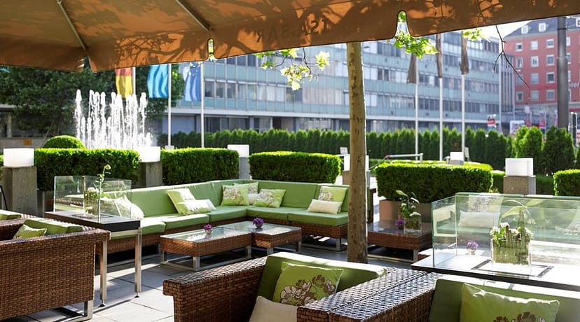 Premium outdoor lounge with fire features for corporate networking and incentive retreats.