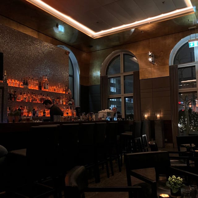 Atmospheric ISArBAR lounge for upscale corporate networking and VIP dinner events.