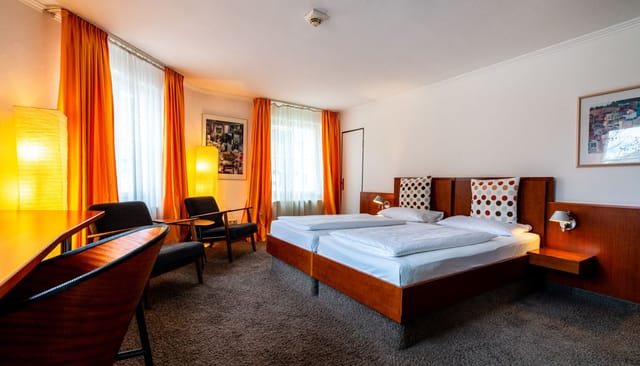 Twin room at Hotel Carlton Munich, comfortable budget accommodation for event group blocks.