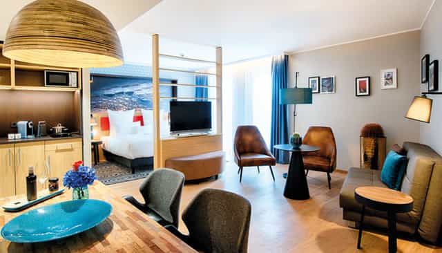 NYX Hotel Munich Heaven Suite: Luxury workspace for executive retreats and VIP offsites.