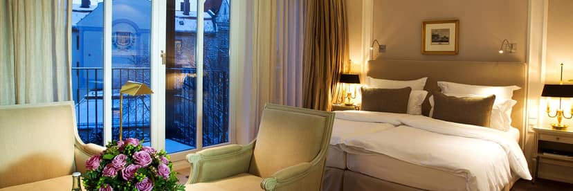 Palace Wintergarten hotel suite with balcony for VIP executive travel and corporate events.