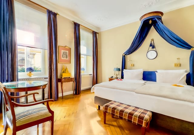 Luxury Hotel Splendid suite with heritage aesthetic for boutique events and VIP offsites.