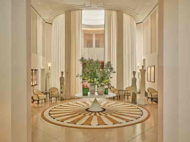 Terrace in Florio hotel lobby with grand architecture for executive events and networking.
