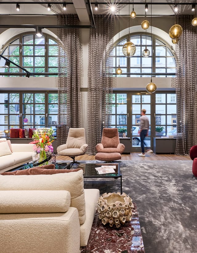 Modern hotel lounge showroom for VIP networking and corporate event venue.