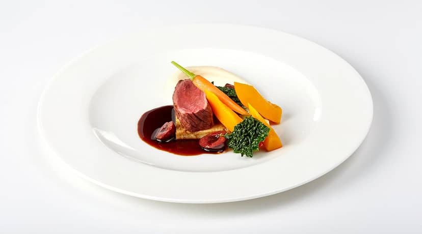 High-end banquet entrée at a Munich dinner theater gala event.
