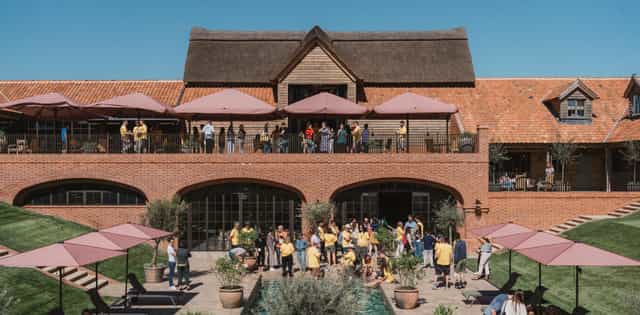 Blyth Barn outdoor venue: multi-level terrace and courtyard for corporate retreats and summer events.