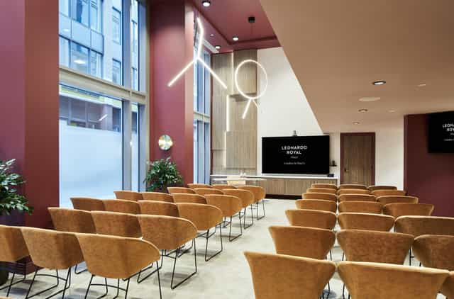 Modern meeting space at Leonardo Royal Hotel, perfect for workshops and presentations.