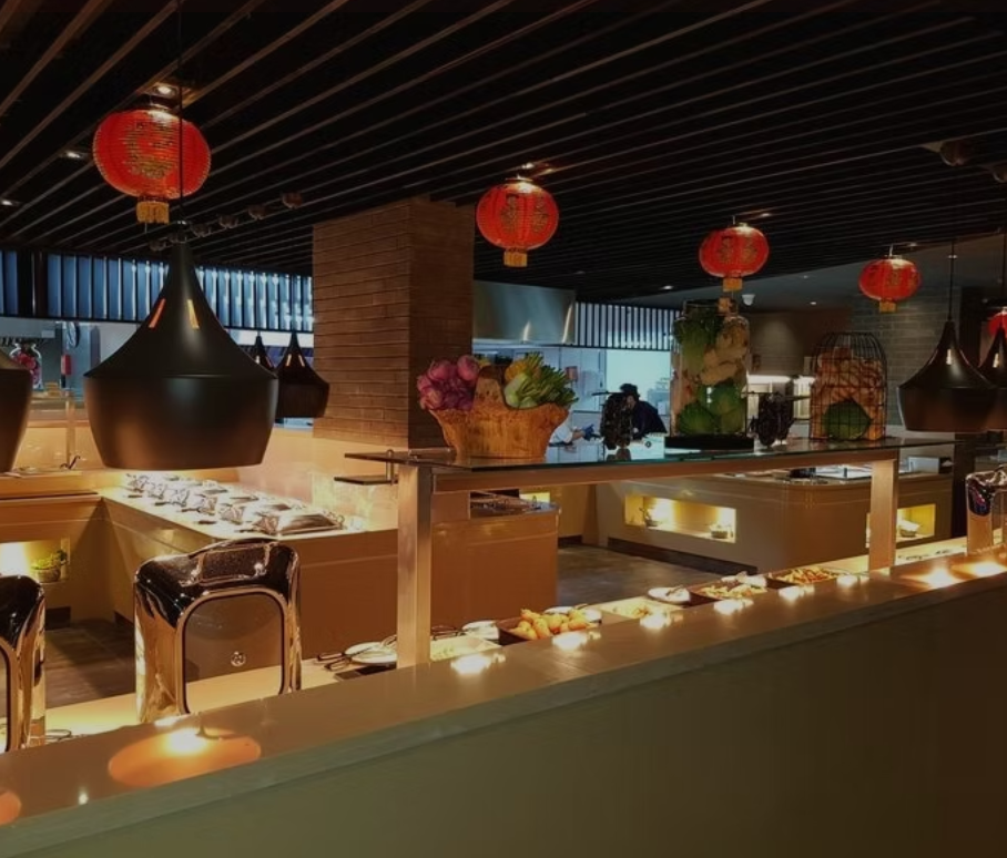 Private hire buffet line with festive decor for corporate event catering and party venue.