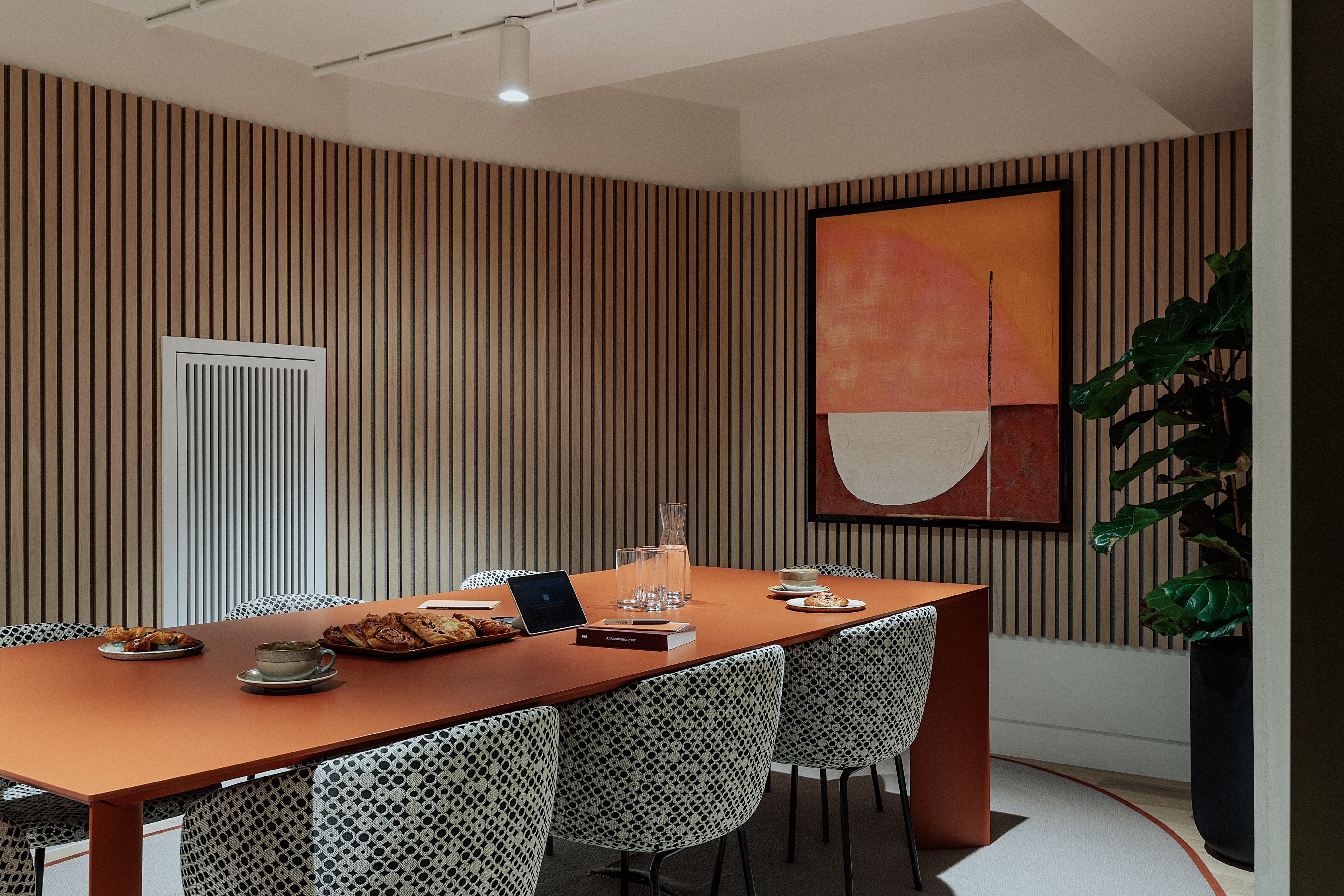 Modern meeting room in Uncommon Holborn, ideal for workshops and brainstorming sessions.