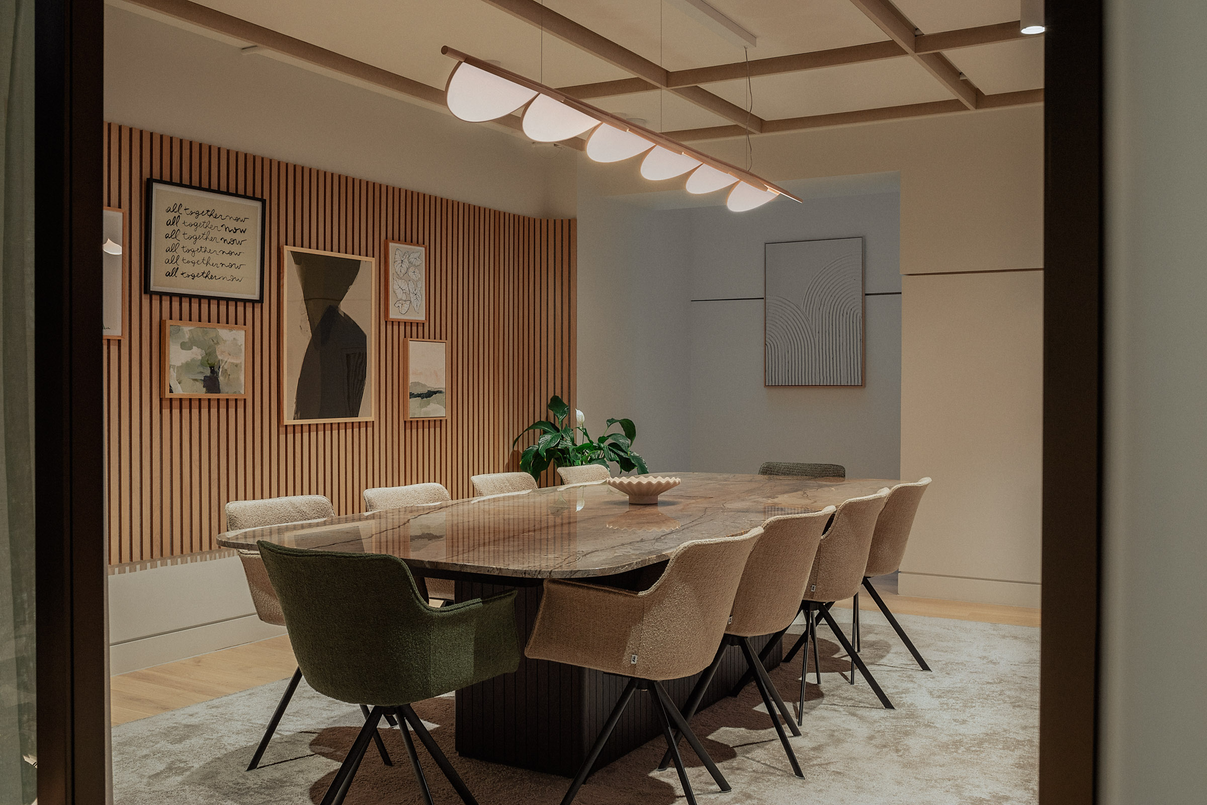 Modern conference room with warm wood accents for productive meetings and presentations.