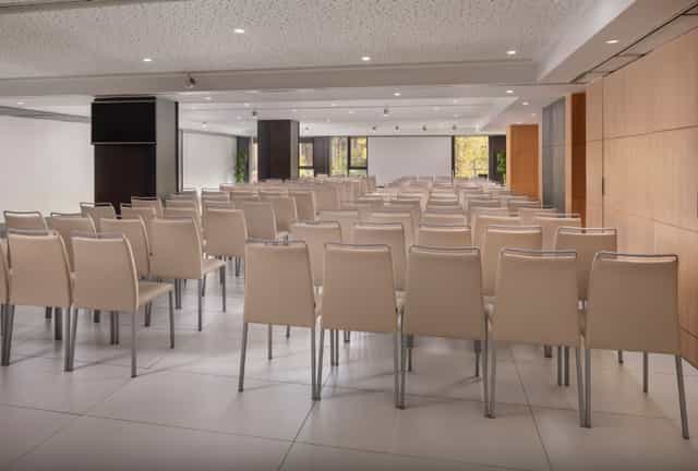 Modern conference room at NH Collection Gran Hotel Calderón for business meetings and corporate events.