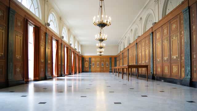 Coudenberg Palace atrium with ornate wood paneling for gala events and cocktail receptions.