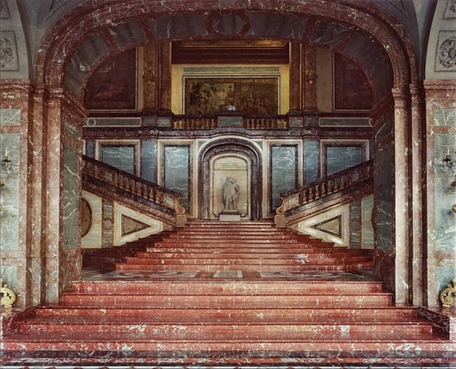 Coudenberg Palace conference center stairs for dramatic gala event planning and VIP red carpets.