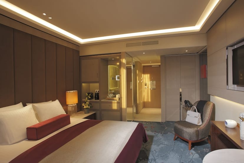 Upscale Tangla Hotel Brussels room for VIP event accommodation and luxury speaker lodging.