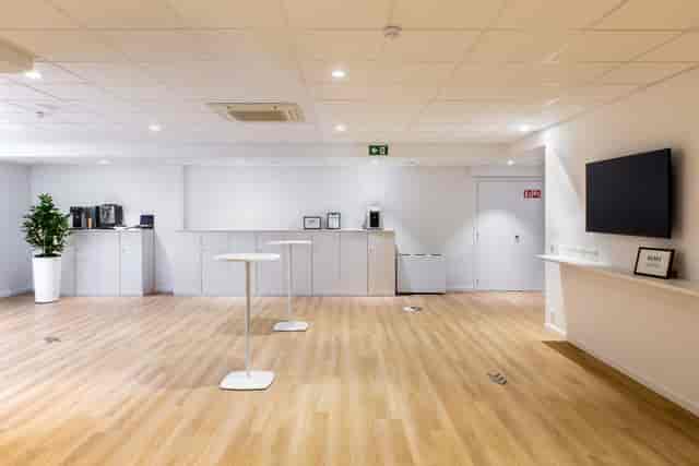 ACE Events breakout room with high-top networking tables for corporate meetings and conferences.