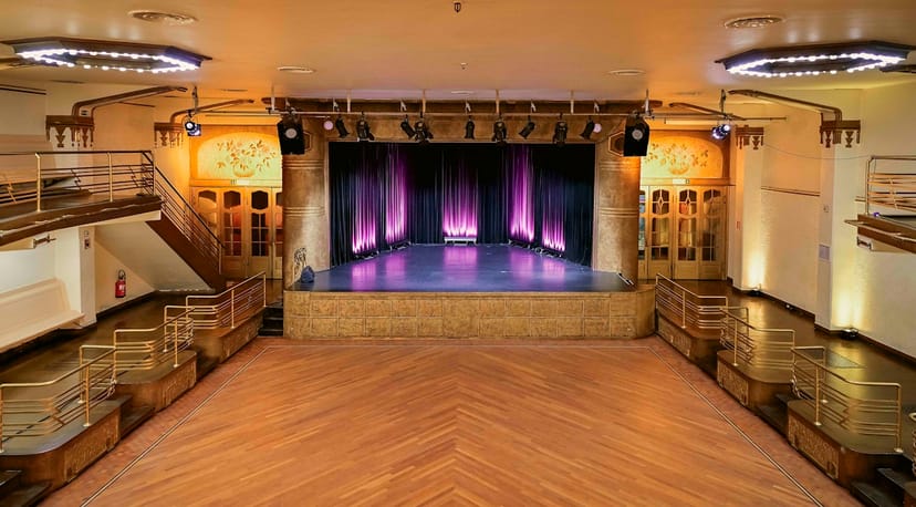 Chaplin Auditorium: Tiered event space with proscenium stage for corporate presentations and galas.
