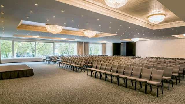 Grand Ballroom at The Hotel Brussels: theater-style seating for corporate plenary sessions.