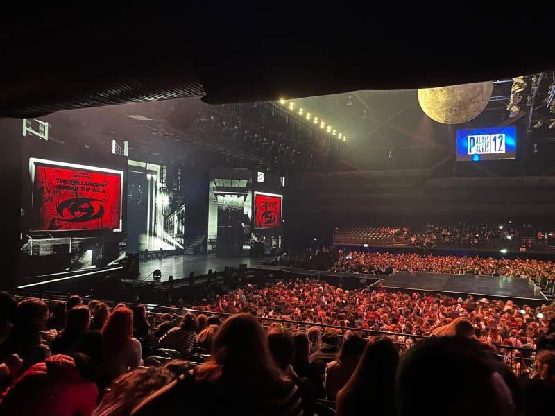 Sold-out ING Arena concert with multi-screen AV setup for large-scale experiential event.