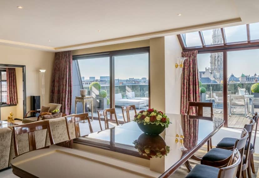 Grand Place Suite Brussels: Luxury boardroom with terrace for executive retreats and networking.