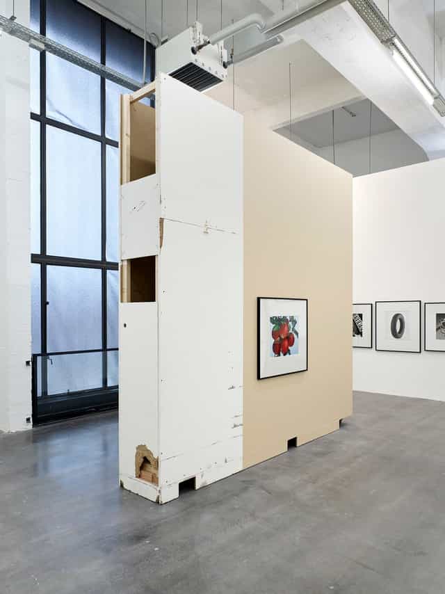 WIELS modern art museum exhibition space with unfinished plywood walls for event gallery rental.