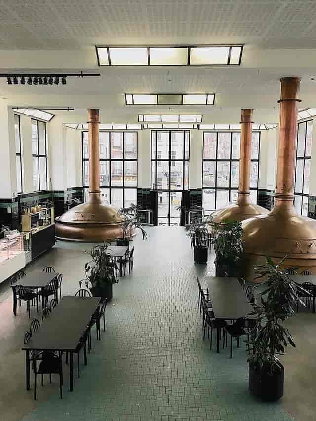 Copper brewing vessels at The Brewing Hall, WIELS: industrial-chic event venue and brand activation.