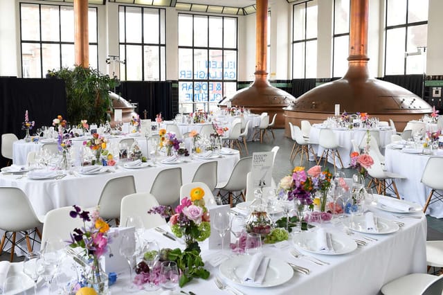 Industrial event space at WIELS with brewery decor for corporate meetings and gala dinners.