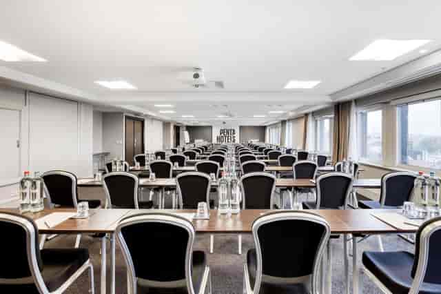 Classroom-style meeting room in Brussels for corporate training and conference events.