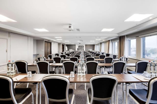 Classroom-style meeting room in Brussels for corporate training and conference events.