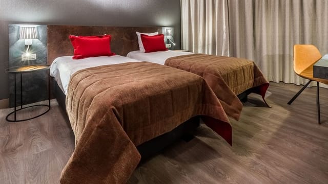 Twin-occupancy hotel room at Martin’s Brussels EU for conference accommodation and business travel.