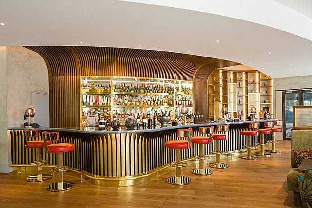 Sofitel Brussels Lobby bar featuring luxury architectural lighting for VIP and networking events.