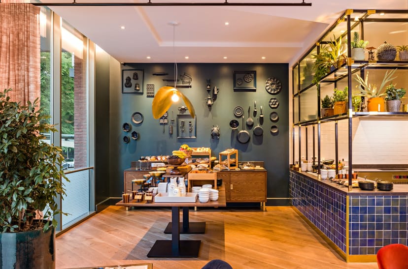Jourdan Lounge breakfast station with tiered shelving for business meetings and corporate events.